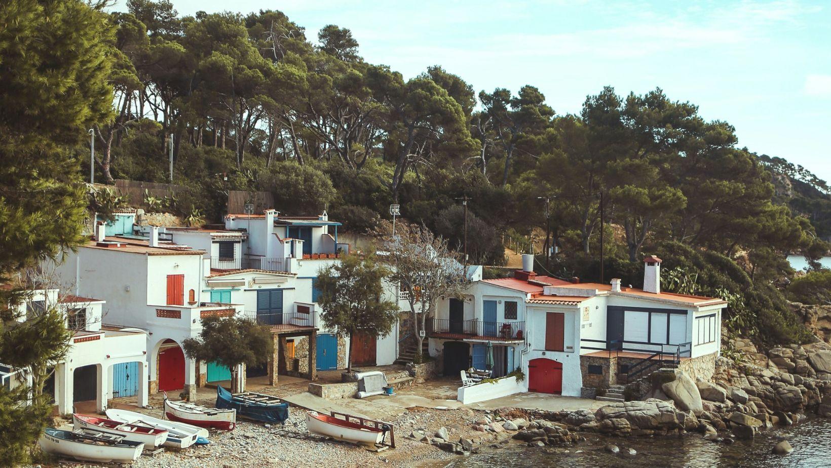 Row of traditional houses beside a river